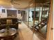 Open living room featuring a sofa and staircase at 201 Lake Bonny E Dr, Lakeland, FL 33801