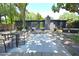 Large outdoor patio features multiple seating areas and a dining table at 3632 Mockingbird Ln, Orlando, FL 32803
