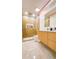 Modern bathroom featuring a glass shower, vanity, and a lighted mirror at 1315 Olympia Park Cir, Ocoee, FL 34761