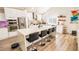 Modern kitchen with stainless steel appliances, island with seating, and quartz countertops at 1315 Olympia Park Cir, Ocoee, FL 34761