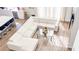Bright living room with white sectional couch, glass coffee table, and lots of natural light at 1315 Olympia Park Cir, Ocoee, FL 34761
