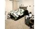 Bedroom with a bed, photo display and a ceiling fan at 10601 Burlwood Dr, Leesburg, FL 34788