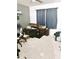Bedroom with a bed, ceiling fan, gray and white walls and gray curtains at 10601 Burlwood Dr, Leesburg, FL 34788