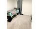 Bedroom with carpeted floors, a bed and natural light at 10601 Burlwood Dr, Leesburg, FL 34788
