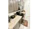 Efficient kitchen featuring black appliances and practical counter space at 10601 Burlwood Dr, Leesburg, FL 34788