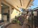 Backyard featuring a covered porch with bicycles and dog kennel with access to the kitchen at 2341 Weber St, Lakeland, FL 33801