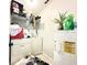 Functional laundry area with a washer, dryer, and water heater, providing essential home services at 2341 Weber St, Lakeland, FL 33801