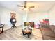 Inviting living room with a ceiling fan and wood laminate floors at 2341 Weber St, Lakeland, FL 33801