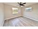 Bedroom showcasing wood-look flooring and a neutral color scheme, a blank canvas to decorate at 1968 Pleasant Hill Rd, Kissimmee, FL 34746
