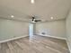 Spacious living room with wood-look flooring and neutral walls, ready for your personal touch at 1968 Pleasant Hill Rd, Kissimmee, FL 34746