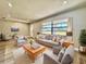 Bright living room with comfortable seating, stylish decor, and plenty of natural light at 1968 Pleasant Hill Rd, Kissimmee, FL 34746