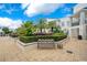 Beautiful courtyard with well-maintained greenery and benches for relaxing at 2305 Edgewater Dr # 1606, Orlando, FL 32804