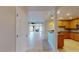 Spacious living room with tiled floors, fireplace, bar and open floor plan to the kitchen at 2305 Edgewater Dr # 1606, Orlando, FL 32804