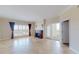 Bright living room with fireplace, large windows, and balcony access at 2305 Edgewater Dr # 1606, Orlando, FL 32804