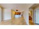 Open-concept living space with tile floors, leading to the kitchen, bathroom and more at 2305 Edgewater Dr # 1606, Orlando, FL 32804