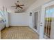 Outdoor terrace with ceiling fans and entry to the home at 2305 Edgewater Dr # 1606, Orlando, FL 32804
