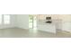 Open kitchen with stainless steel appliances and plenty of counter space at 2559 Driftwood St, Auburndale, FL 33823