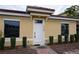Charming single-story home featuring a red tile roof and tidy landscaping at 1758 Coriander Dr # 1758, Poinciana, FL 34759