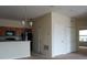 Open-concept kitchen featuring stainless steel appliances and a breakfast bar at 1758 Coriander Dr # 1758, Poinciana, FL 34759