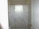 This bathroom shows a shower/tub combo with a marble-look curtain at 8890 Sw 104Th Cir, Ocala, FL 34481