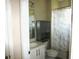 This bathroom features a modern vanity, cabinet, and a shower/tub at 8890 Sw 104Th Cir, Ocala, FL 34481