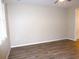 This bedroom boasts light wood-look floors and a neutral color scheme at 8890 Sw 104Th Cir, Ocala, FL 34481