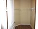 This closet offers plenty of space for storage, with light wood-look floors at 8890 Sw 104Th Cir, Ocala, FL 34481