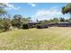 Green backyard showing lawn and trees at 4012 Shorecrest Dr, Orlando, FL 32804