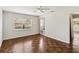 Bedroom featuring wood floors, lots of light, and ensuite bathroom at 4012 Shorecrest Dr, Orlando, FL 32804