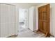 Hallway with tile floor, doors, and closet at 4012 Shorecrest Dr, Orlando, FL 32804