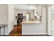 Modern kitchen with granite counters, stainless steel appliances, and stylish backsplash at 4012 Shorecrest Dr, Orlando, FL 32804