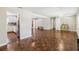 Expansive living room showcasing hardwood floors, neutral walls, and seamless flow throughout the home at 4012 Shorecrest Dr, Orlando, FL 32804