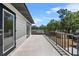 Spacious outdoor balcony features modern railings and ample sunlight, perfect for relaxing outdoors at 1352 Charlotte St, Altamonte Springs, FL 32701