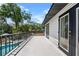 Balcony view of private in-ground swimming pool and fenced backyard at 1352 Charlotte St, Altamonte Springs, FL 32701