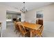 Light and open dining space adjoining a living room and kitchen for seamless entertaining at 1352 Charlotte St, Altamonte Springs, FL 32701
