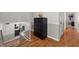 Upstairs hallway with hardwood flooring and decorative wainscoting at 1352 Charlotte St, Altamonte Springs, FL 32701