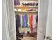 Walk-in closet with shelves and hanging racks for optimal storage and organization at 53 Paine Dr, Winter Haven, FL 33884
