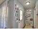 Entryway with coat rack, photos, and front door at 53 Paine Dr, Winter Haven, FL 33884