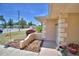 Front porch with inviting landscaping, unique architectural columns, and a well-maintained appearance at 53 Paine Dr, Winter Haven, FL 33884