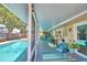 Large screened lanai featuring a beautiful pool view and ample seating options at 53 Paine Dr, Winter Haven, FL 33884