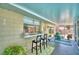 Spacious lanai with bar seating, offering a seamless transition to the outdoors at 53 Paine Dr, Winter Haven, FL 33884