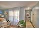 Bright living room featuring hardwood floors, large windows, and stylish furniture at 53 Paine Dr, Winter Haven, FL 33884