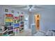 Bright office space featuring custom bookshelves, a stylish desk, and a comfortable workspace at 53 Paine Dr, Winter Haven, FL 33884