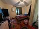 Bedroom featuring a comfortable bed, window, and ample closet space at 1529 Indiana St, Orlando, FL 32805