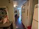 Image of home's interior with hardwood floors and white appliances at 1529 Indiana St, Orlando, FL 32805