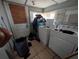 Practical laundry room with machines and storage, offering a functional space at 1529 Indiana St, Orlando, FL 32805