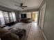 Inviting living room with tile and carpet, natural light, and views towards the outside at 1529 Indiana St, Orlando, FL 32805