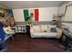 Cozy living room featuring a comfortable sofa and colorful decor for relaxation and entertainment at 1529 Indiana St, Orlando, FL 32805