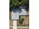 Aerial view of home showcasing roof, yard, and hardscape at 3446 Country Manor Dr, Port Orange, FL 32129
