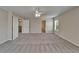 Spacious bedroom with carpeting, and access to walk in closet and bathroom at 2415 Brownwood Dr, Mulberry, FL 33860